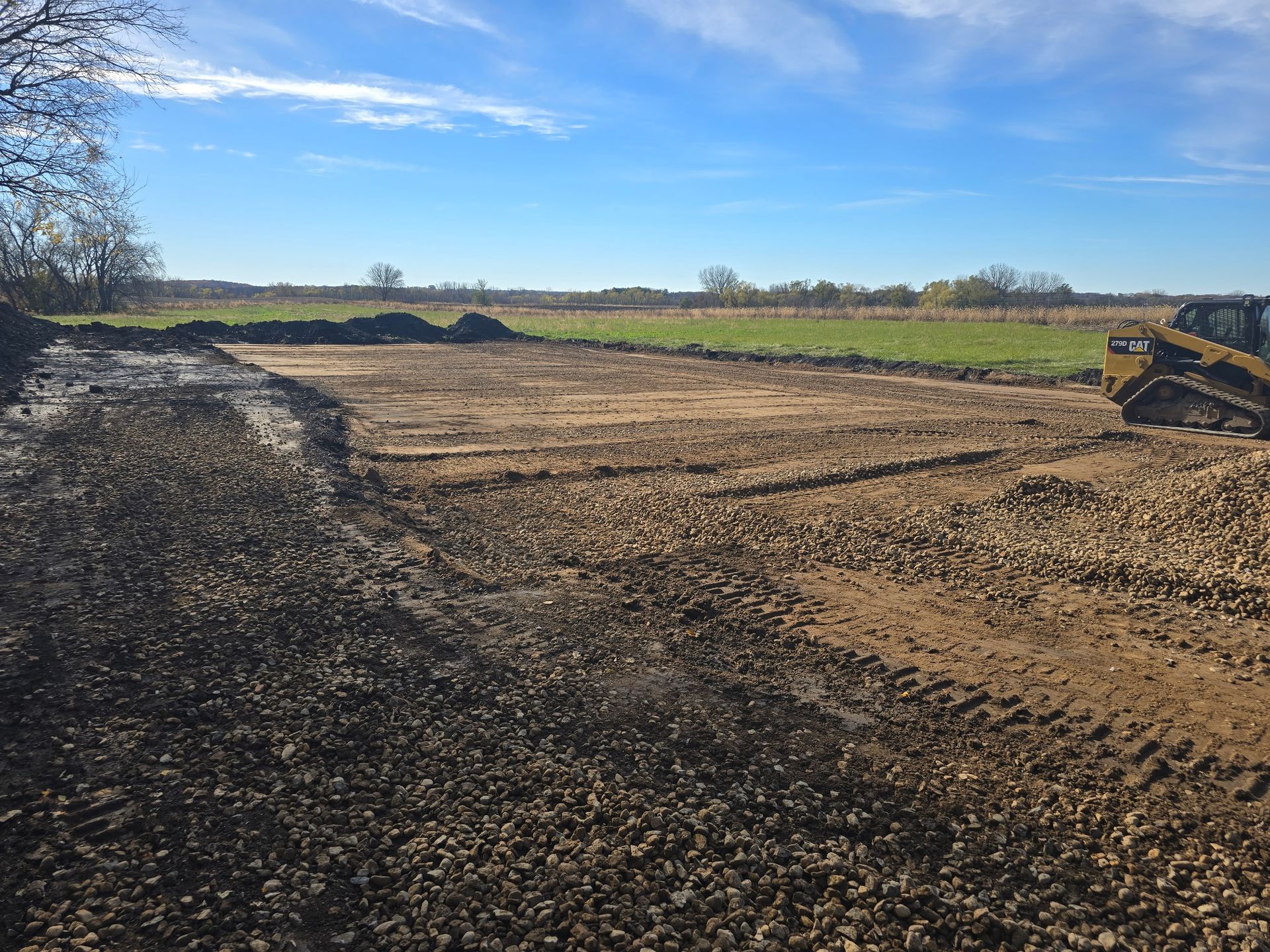 Field leveled and prepared for a pole barn pad