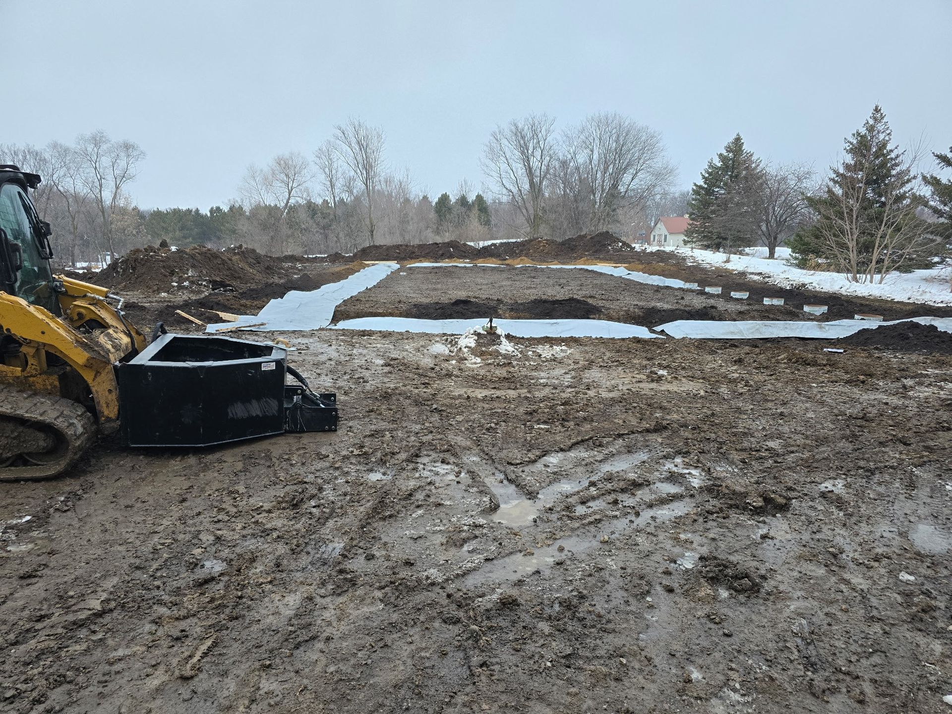 Winter site leveling for a Minnesota pole barn